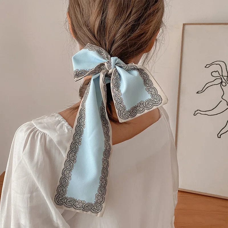 Showlu Silk Scarf Hair Band with letter print and ribbon bow, stylish women's hair accessory for ponytails and hair styling.