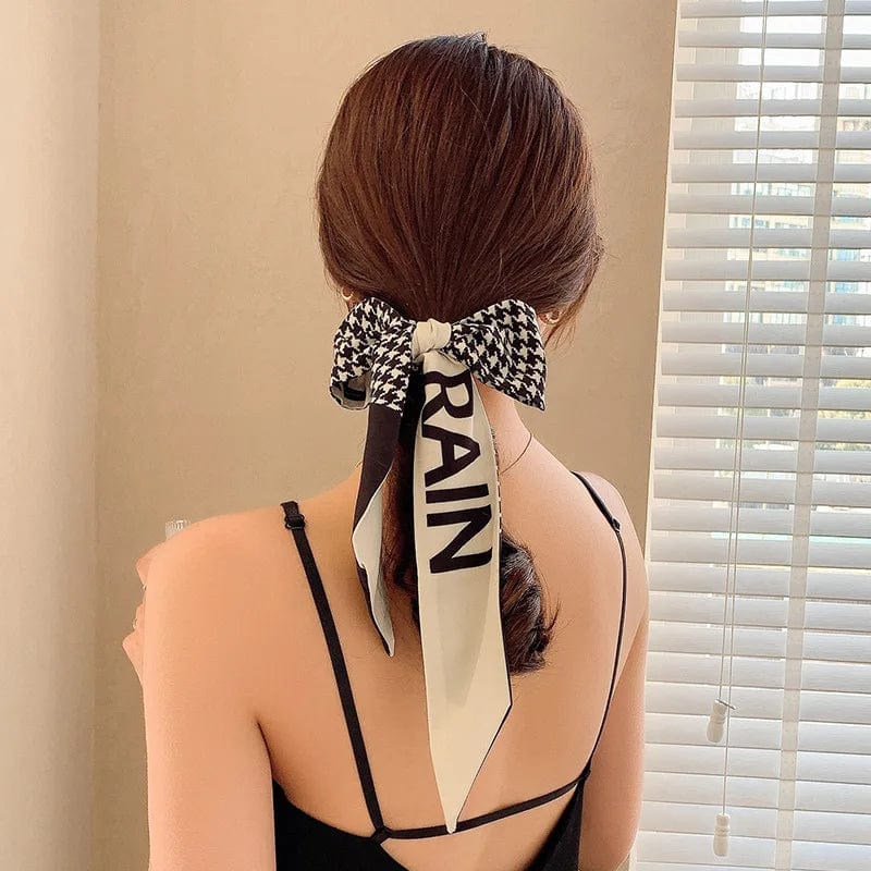 Showlu Silk Scarf Hair Band with long ribbon bow, letter print, and Korean-inspired design for women’s ponytail and hair accessories.