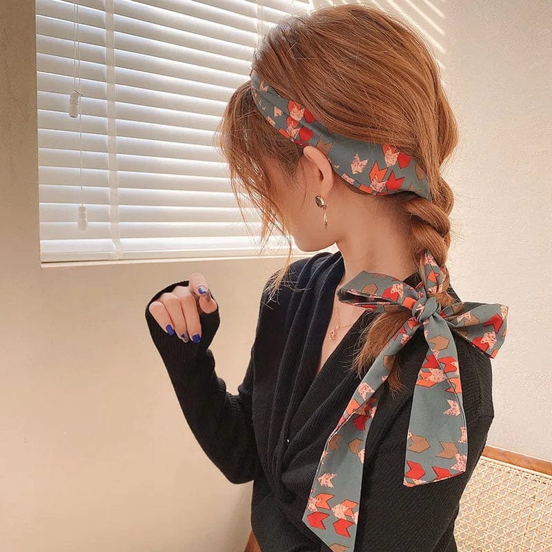 Showlu Silk Scarf Hair Band with long ribbon and letter print, stylish women’s hair accessory for ponytails and hair styling.