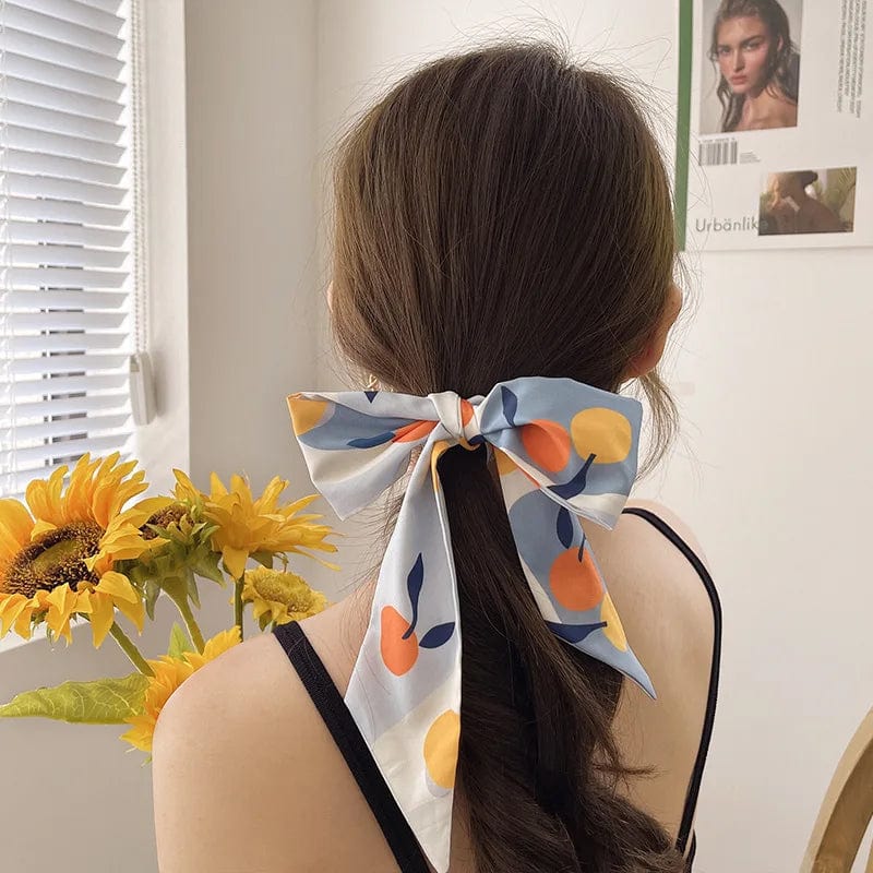 Showlu Silk Scarf Hair Band with long ribbon bow, letter print design, stylish women's hair accessory and ponytail holder.