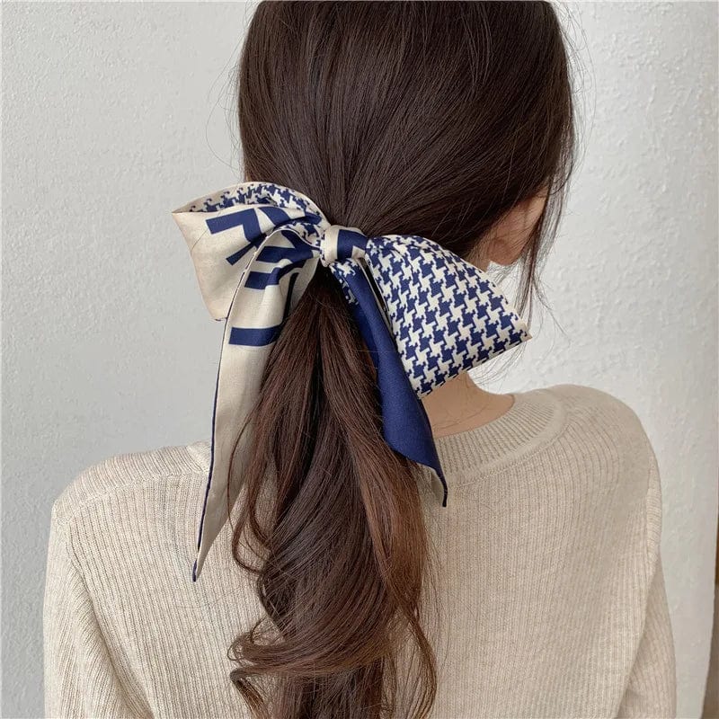 Showlu Silk Scarf Hair Band with long ribbon bow and letter print, stylish women’s hair accessory for ponytails and hair styling.