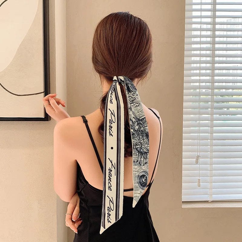 Showlu Silk Scarf Hair Band with long ribbon bow, letter print, and Korean-inspired design for women’s ponytail and hair accessories.