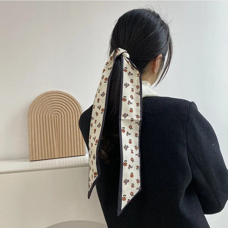 Showlu Silk Scarf Hair Band with long ribbon bow, letter print design, stylish hair accessory for women and ponytails.