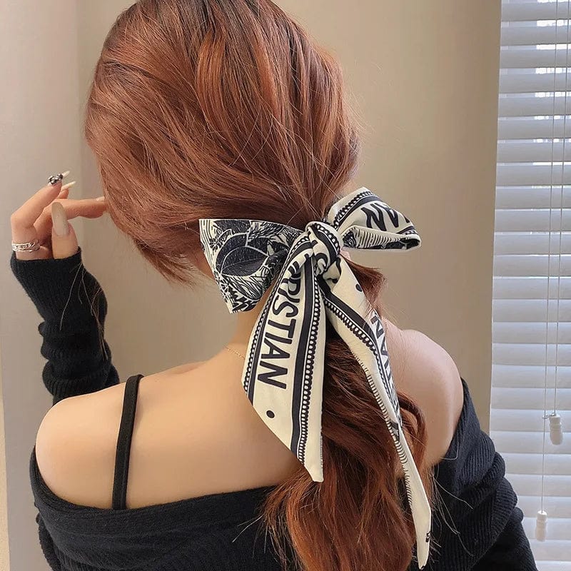 Showlu Silk Scarf Hair Band with letter print and ribbon bow, stylish women's hair accessory for ponytails and hair styling.
