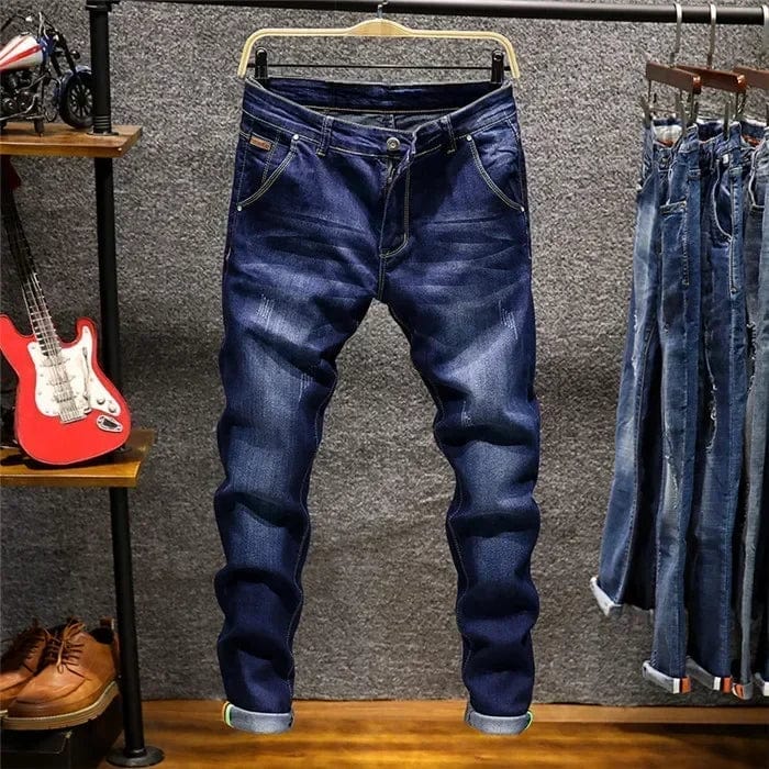 Showlu men's skinny fit denim jeans with zipper fly, slim stretch design, blue color, casual style, perfect for modern men's fashion.