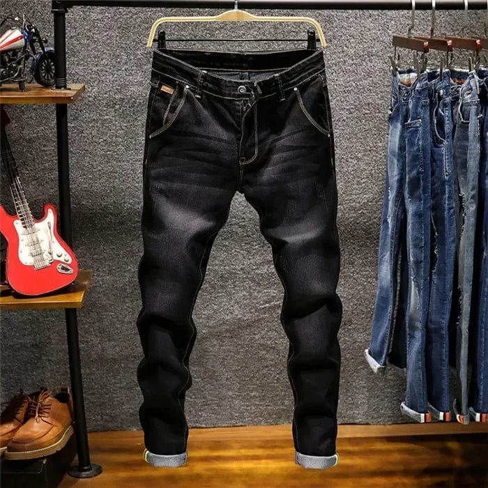 Showlu Men's skinny fit denim jeans in blue with zipper fly, slim stretch design, casual style, and tapered pencil fit.