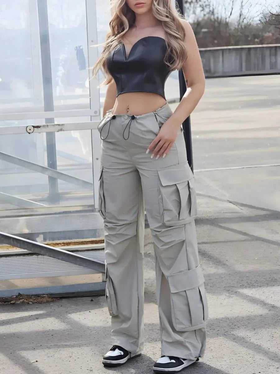 Showlu Women's high waist cargo parachute pants with flap pockets, wide-leg style, drawstring waist, and ruched details for street fashion.