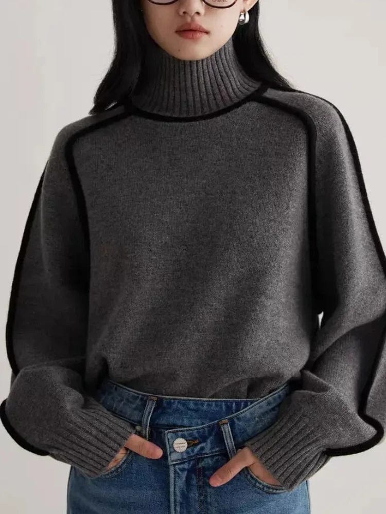 Women's knitted hoodie with turtleneck and lantern sleeves, stylish warm sweater for autumn and winter fashion.