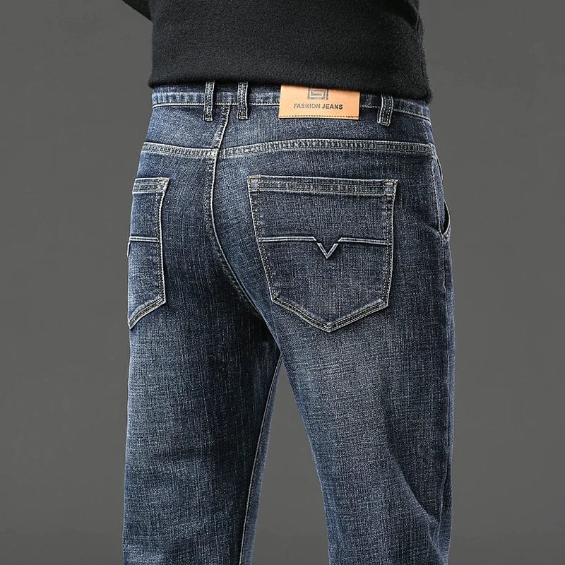 Men's straight leg stretch denim jeans by Showlu Fashion, casual spring style with baggy fit and soft, comfortable fabric.