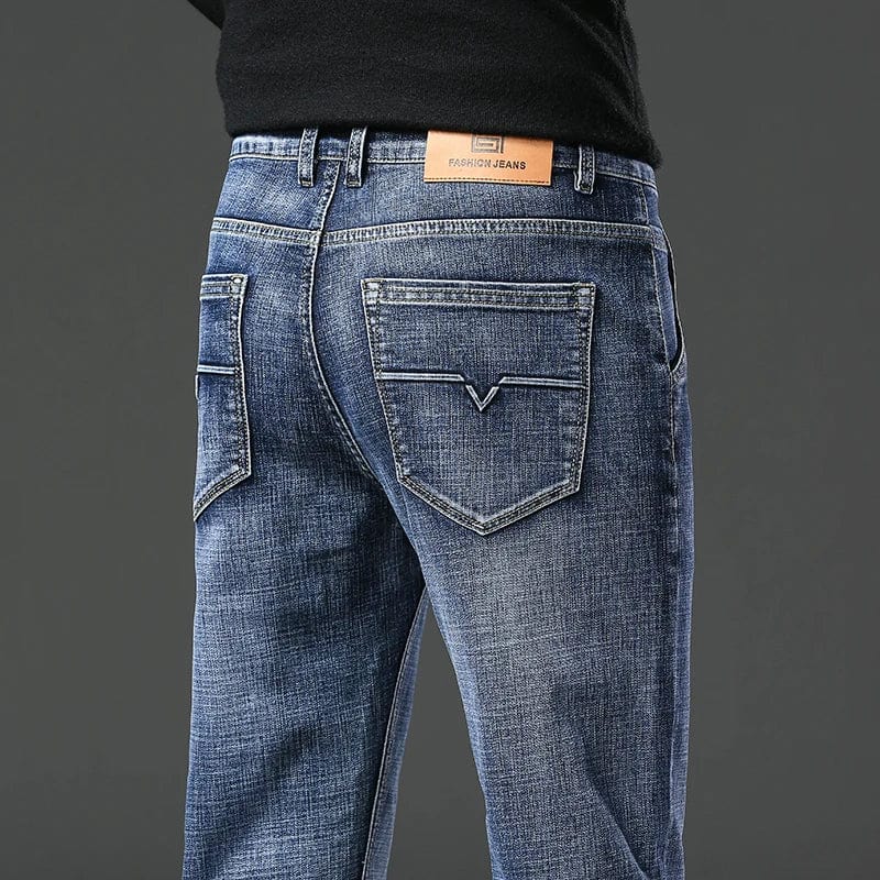 Men's straight leg stretch denim jeans by Showlu Fashion Store, casual spring style with soft, baggy, and comfortable fit.