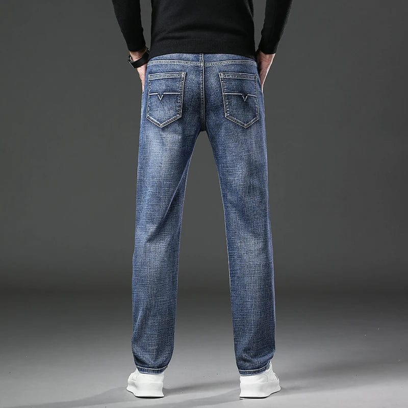 Men's straight leg stretch denim jeans by Showlu Fashion Store, casual spring style with a relaxed fit and soft, comfortable fabric.