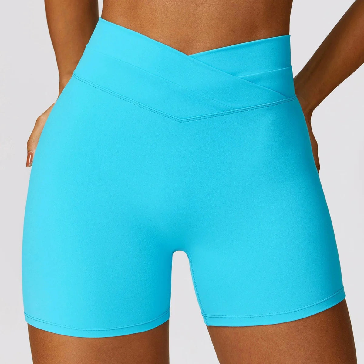 Showlu Fashion women's high waist yoga shorts with brushed fabric, skinny fit, and hip-raise design for workout and running activities.
