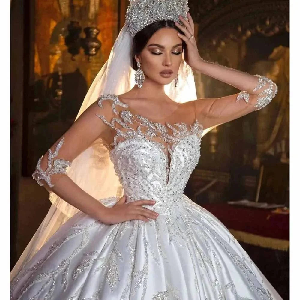 Long satin wedding dress with beaded appliques, O-neck, ball gown style, chapel train, designed for brides by Showlu Fashion Store.