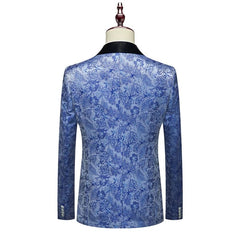 A back view of a blue floral patterned men's suit jacket with a black lapel on a mannequin.