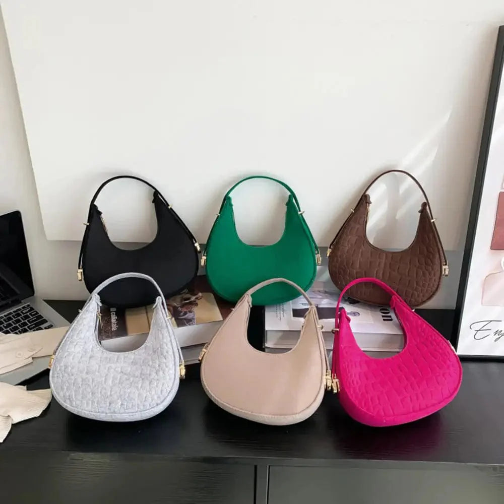 SHOWLU FASHION women's felt alligator pattern shoulder bag with small handle, underarm style, crescent shape, and saddle design.