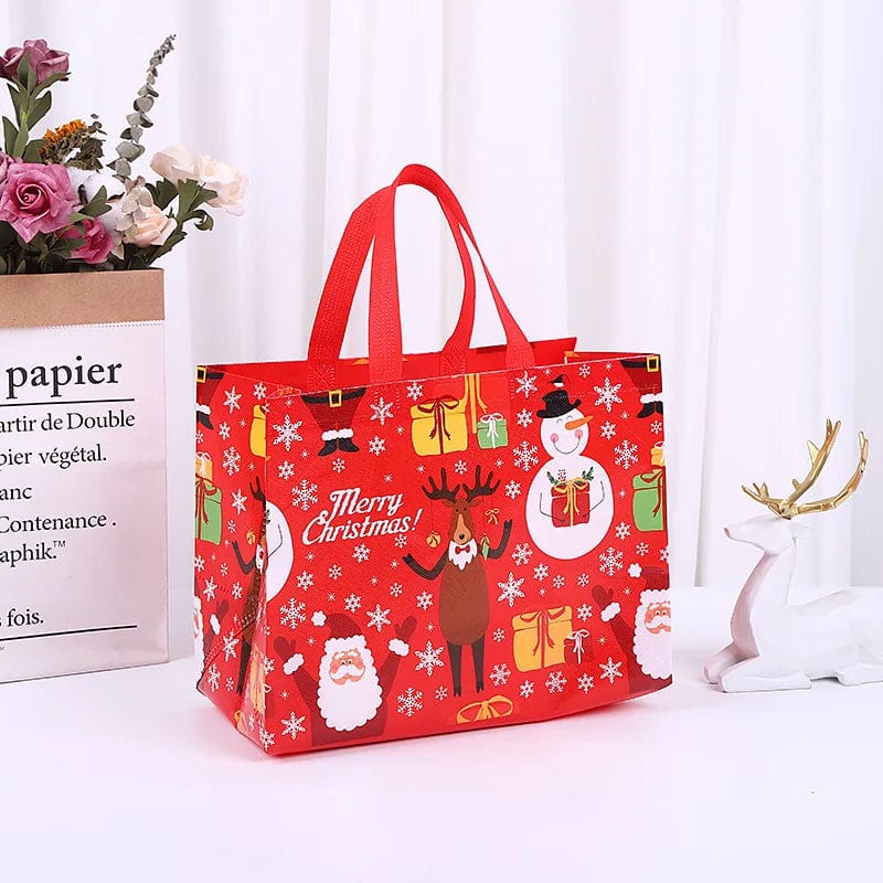 SHOWLU Christmas gift bag with cartoon Santa, elk, and snowman prints, reusable non-woven tote for holiday gifting.