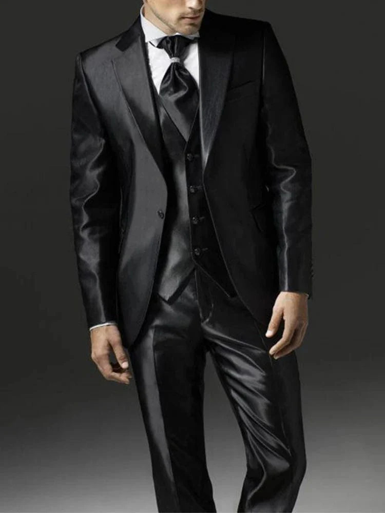 Men's 3-piece black satin wedding suit by Showlu Fashion with slim fit tuxedo jacket, pants, and vest, suitable for formal occasions.