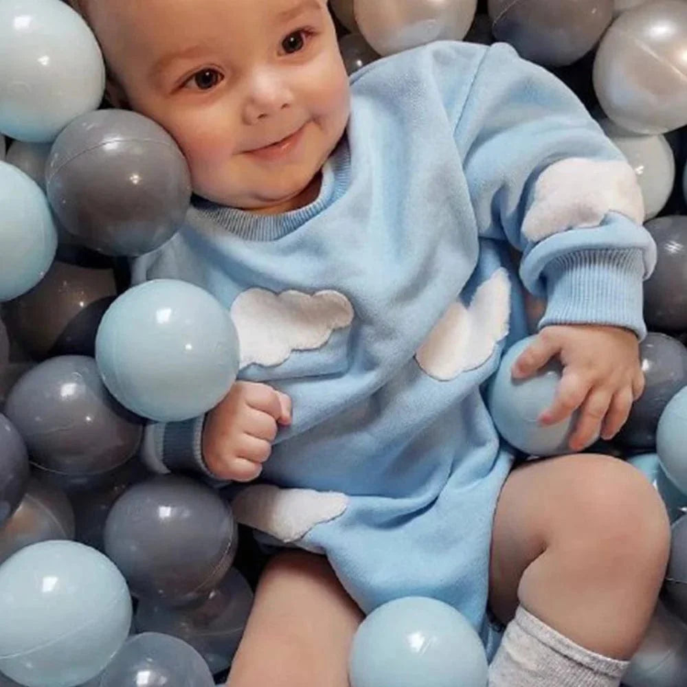 Unisex Showlu cotton baby romper with cloud pattern, short sleeves, color splicing, perfect for newborns and baby boys.