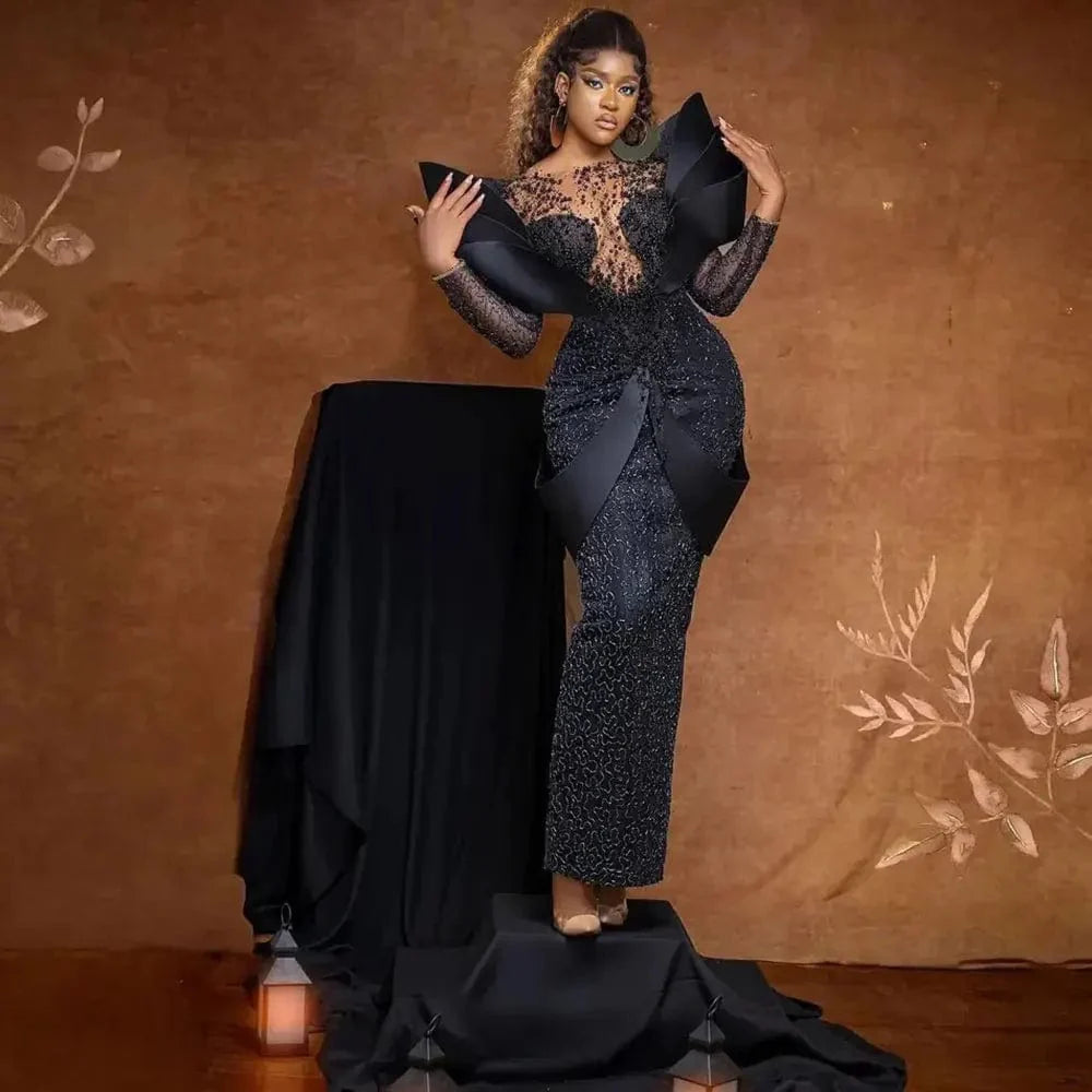 Black lace mermaid evening dress with off-shoulder design, form-fitting silhouette, and elegant details for prom or formal events.