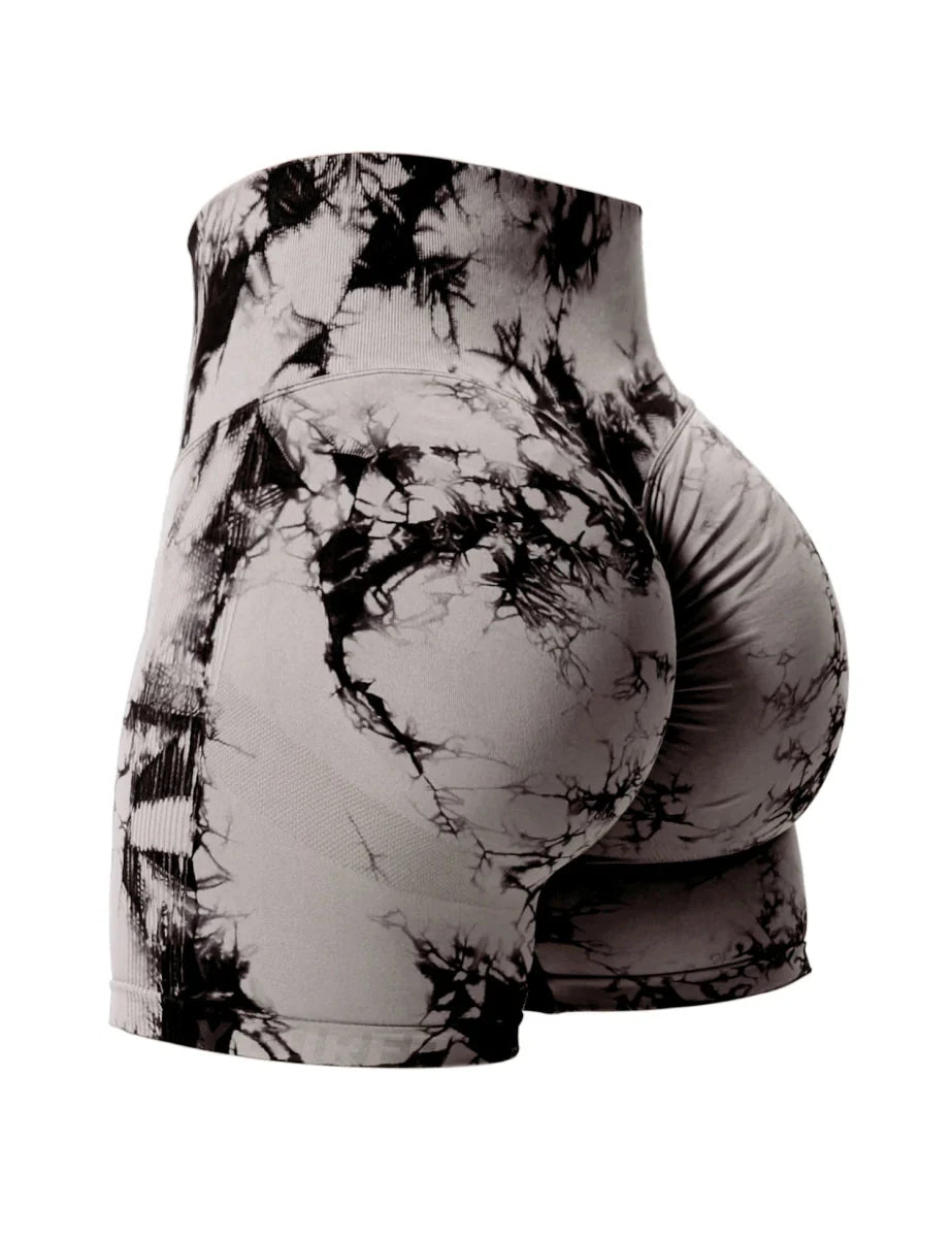Showlu Fashion CHRLEISURE tie dye seamless fitness shorts with high waist and butt lifting design for women’s activewear.