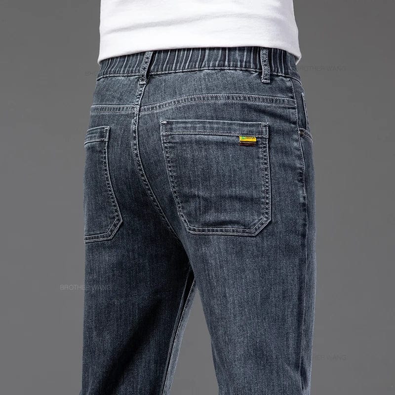 Brother Wang men's summer lightweight straight leg jeans with elastic waist, casual denim pants in various sizes.