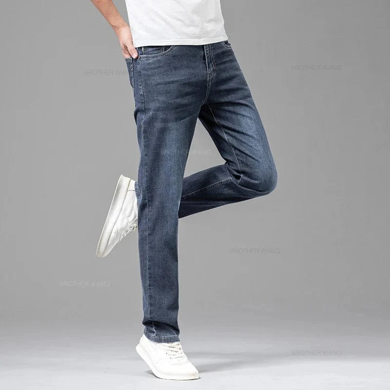 Brother Wang men's lightweight gray cotton jeans with straight fit, elastic fabric, casual and comfortable summer fashion.