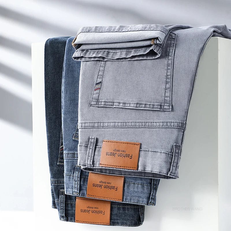 Brother Wang men's lightweight gray cotton jeans with straight fit, elastic fabric, suitable for casual and business summer wear.