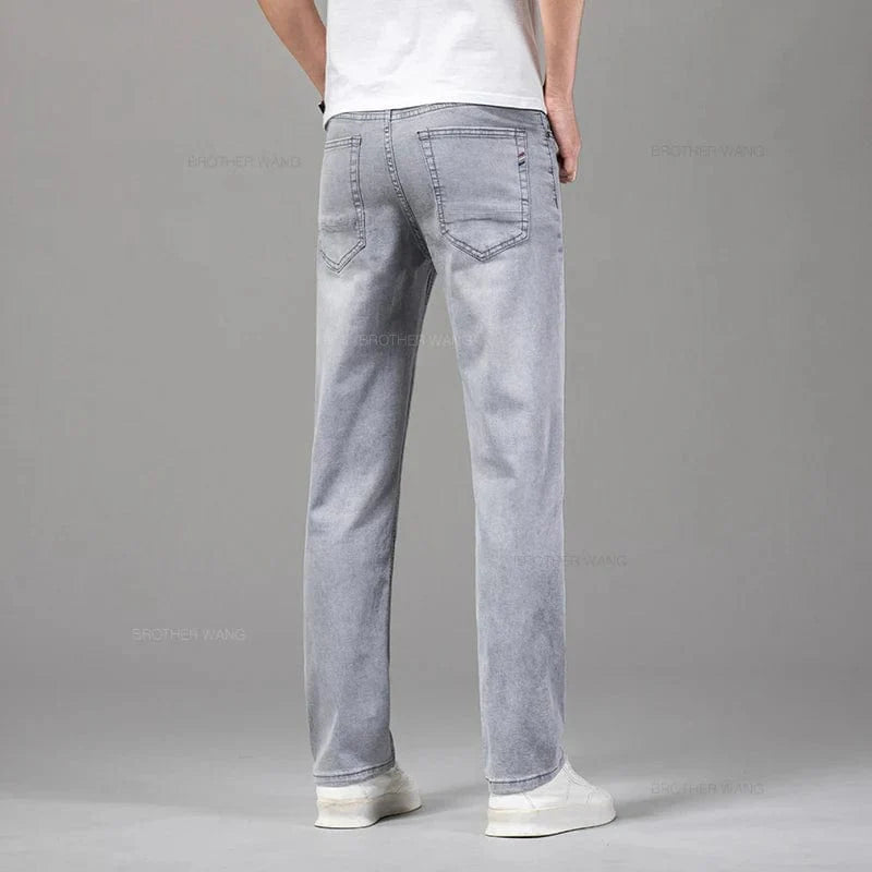 Brother Wang men's summer lightweight straight cotton jeans in gray, showing the casual fit and elastic waistband for comfort.