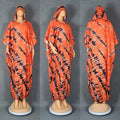 African Dashiki Ankara maxi dress with vibrant patterns, traditional Muslim kaftan style, long flowing gown for women.