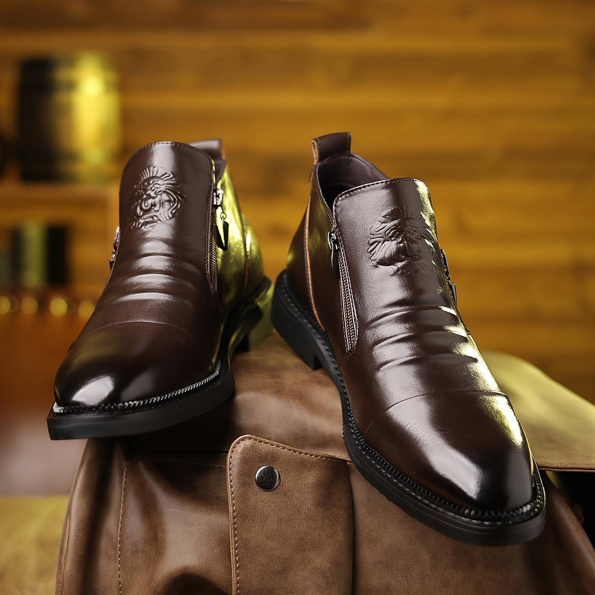 Black embossed lion ankle boots for men by SHOWLU FASHION STORE, glossy PU leather with detailed lion design and sturdy sole.