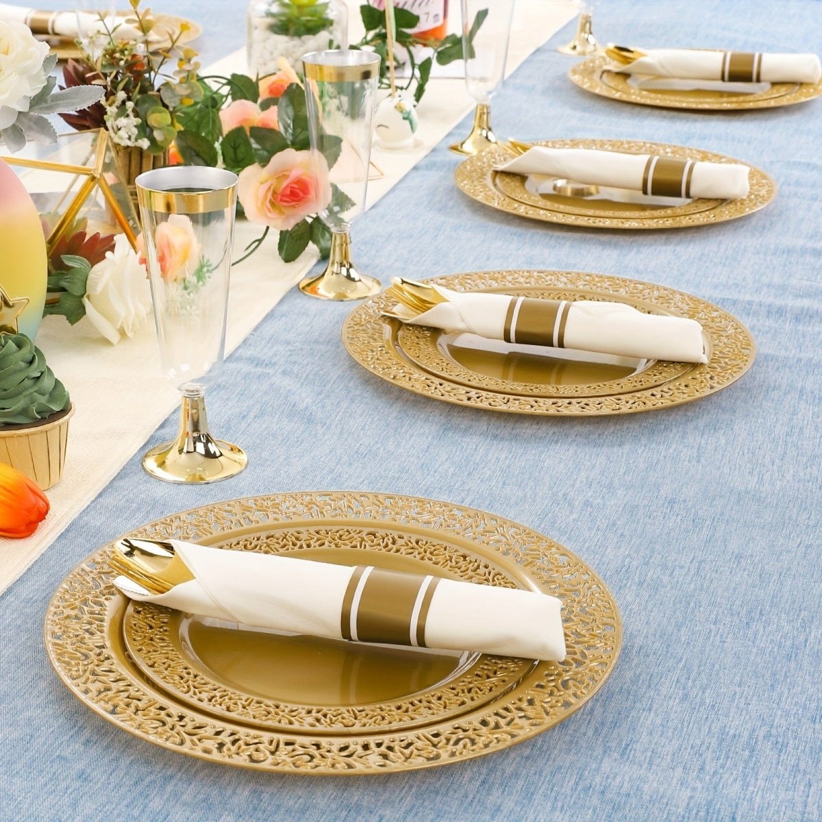 Showlu 210-piece gold disposable plastic plates, cutlery, and cups set for parties, including dinner and dessert plates.