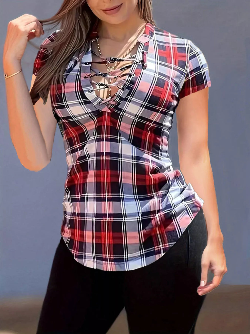 Plaid lace-up short sleeve blouse by Trendsi with button details and a relaxed fit, showcasing a stylish casual top.