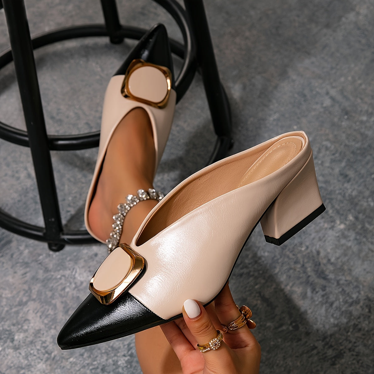 SHOWLU Women's pointed toe block heel mules in two-tone PU leather, showcasing stylish slip-on shoes with a modern design.