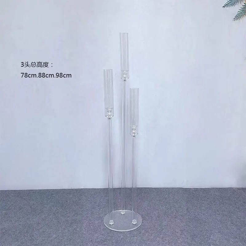 Set of clear acrylic MS Made candlestick holders, ideal wedding centerpieces and event decorations with elegant candle display.
