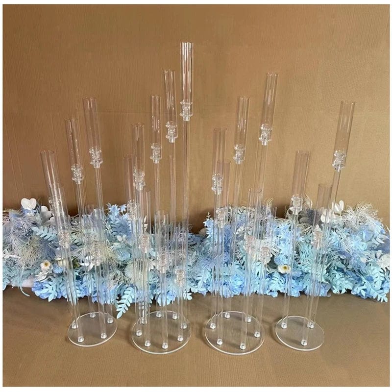 Set of clear acrylic MS Made candlestick holders for wedding centerpieces, perfect for elegant wedding or event decor.