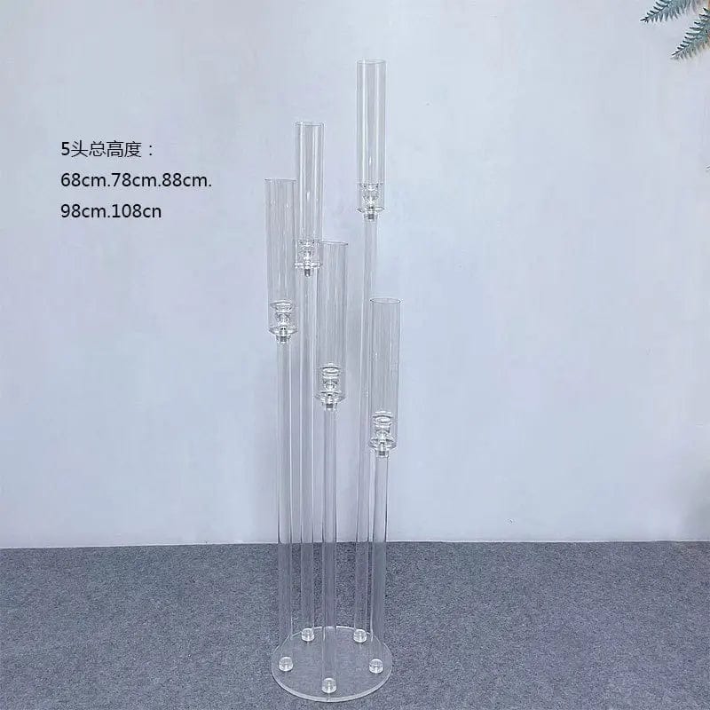 Set of clear acrylic MS Made candleholders for weddings and events, ideal as elegant centerpieces and wedding decor.