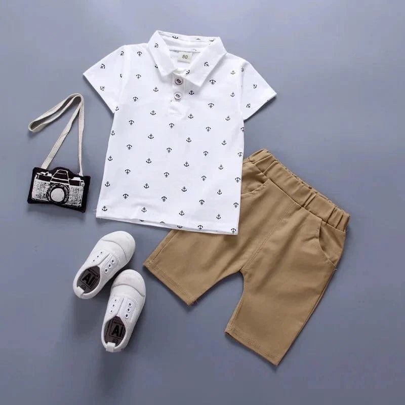 Showlu Boys 2-piece cotton summer set with anchor print shorts and tee, perfect for toddlers ages 1-5.