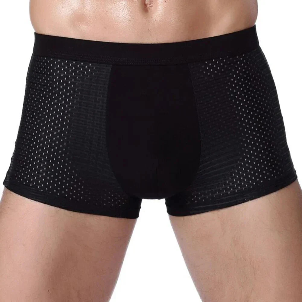 Two pairs of breathable bamboo fiber men's boxer shorts in solid colors, available in plus sizes L to 7XL.