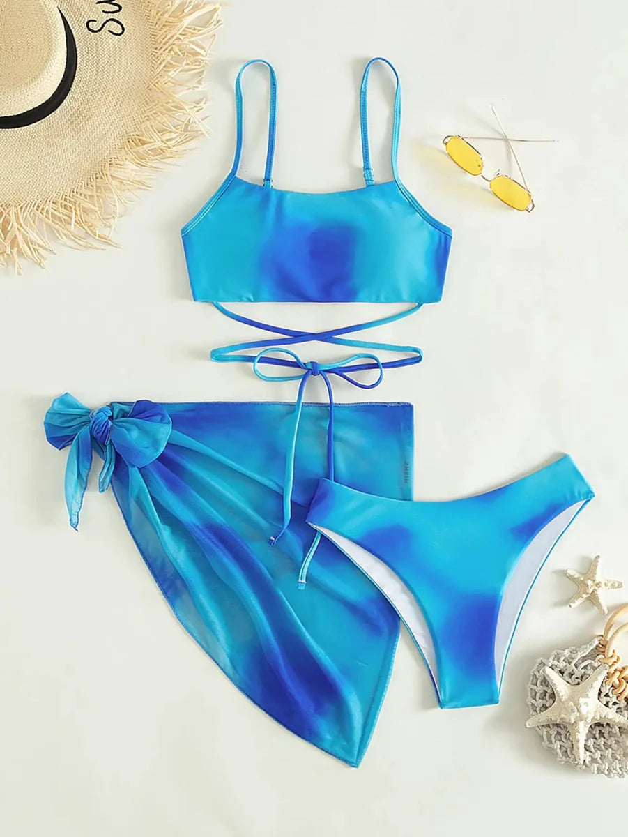 Showlu Fashion Lyric Ombre 3-piece lace-up bikini set with beach skirt, featuring gradient swimwear for women’s summer beachwear.