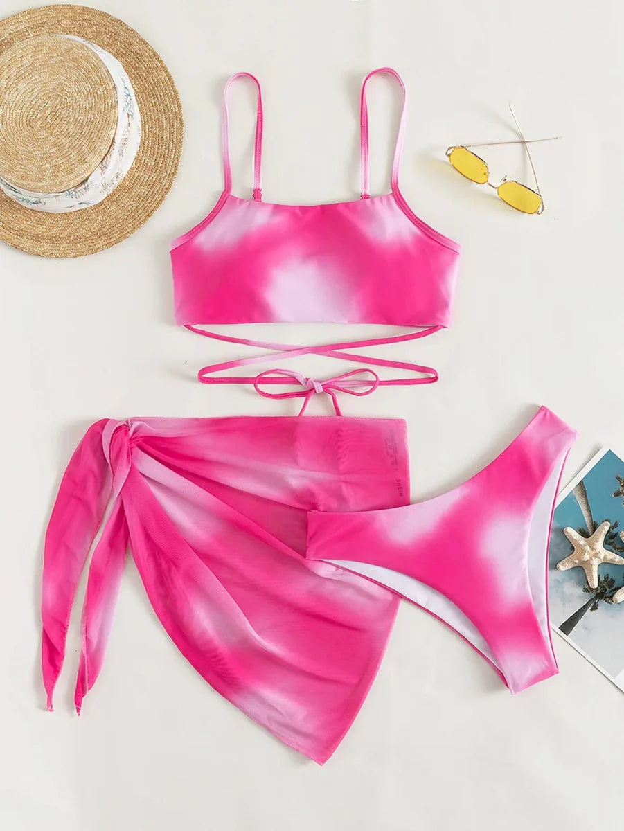 Showlu Fashion Lyric Ombre 3-piece lace-up bikini set with beach skirt, featuring gradient swimwear design for women’s summer beachwear.