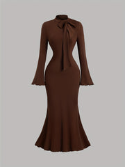 Elegant Long-Sleeve Mermaid Dress with a High Collar And Bow Tie, Fitted for Gatherings And Accentuating Curves.