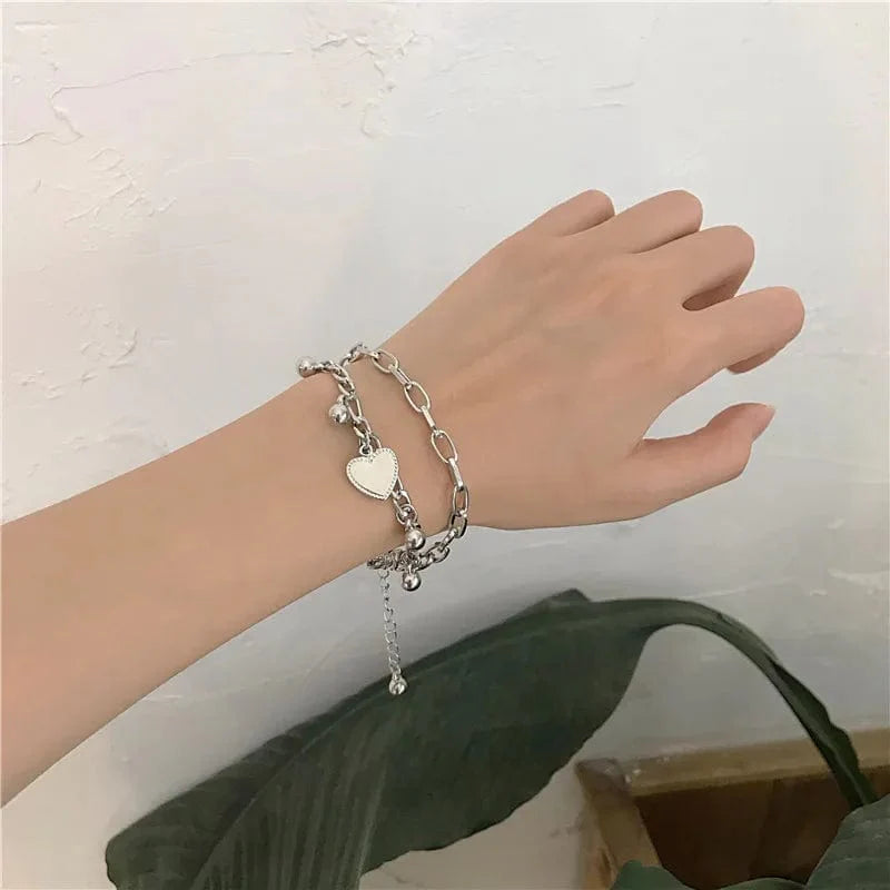 Gold Ramos Heart Bracelet for women, stainless steel multilayer jewelry with love heart charms, rustproof and high-quality gold finish.