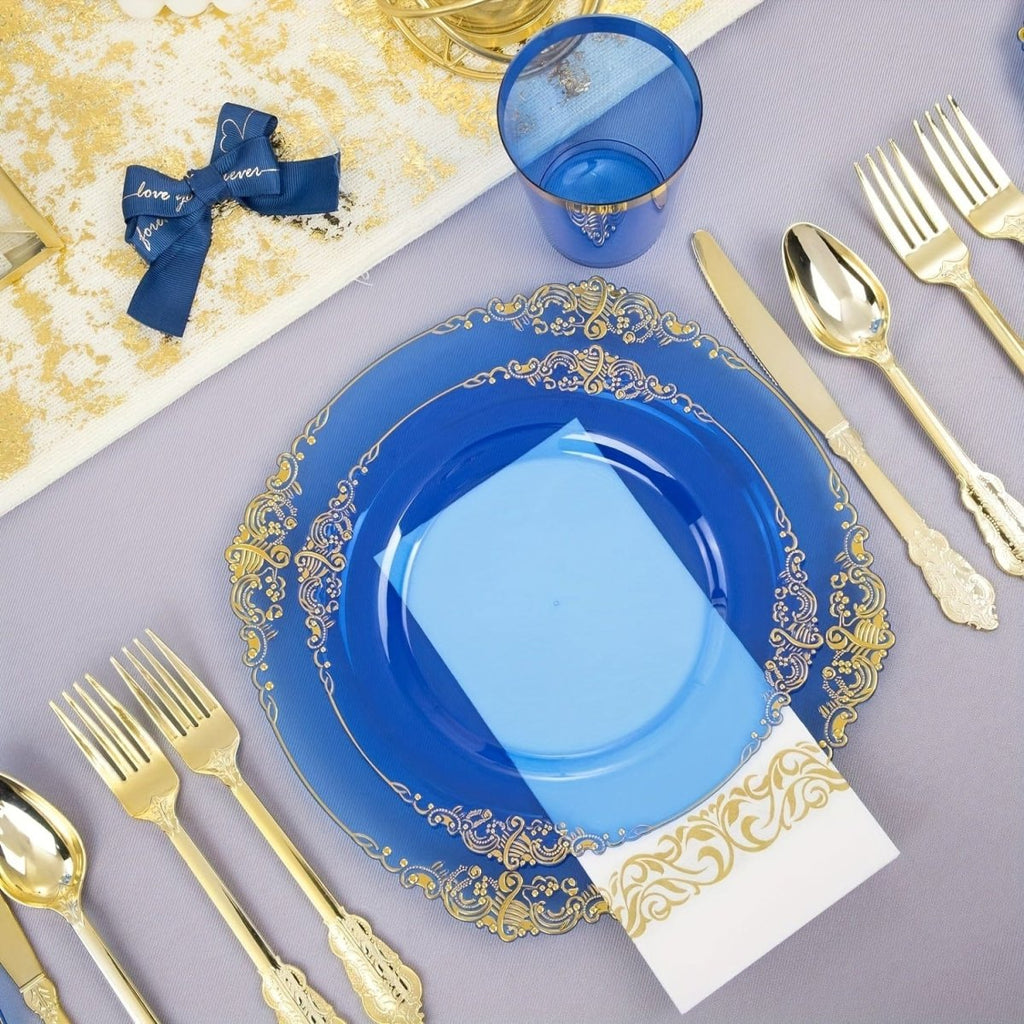 Blue plastic dinnerware set with 50 plates, cups, napkins, and gold silverware for 50 guests, ideal for parties and events.