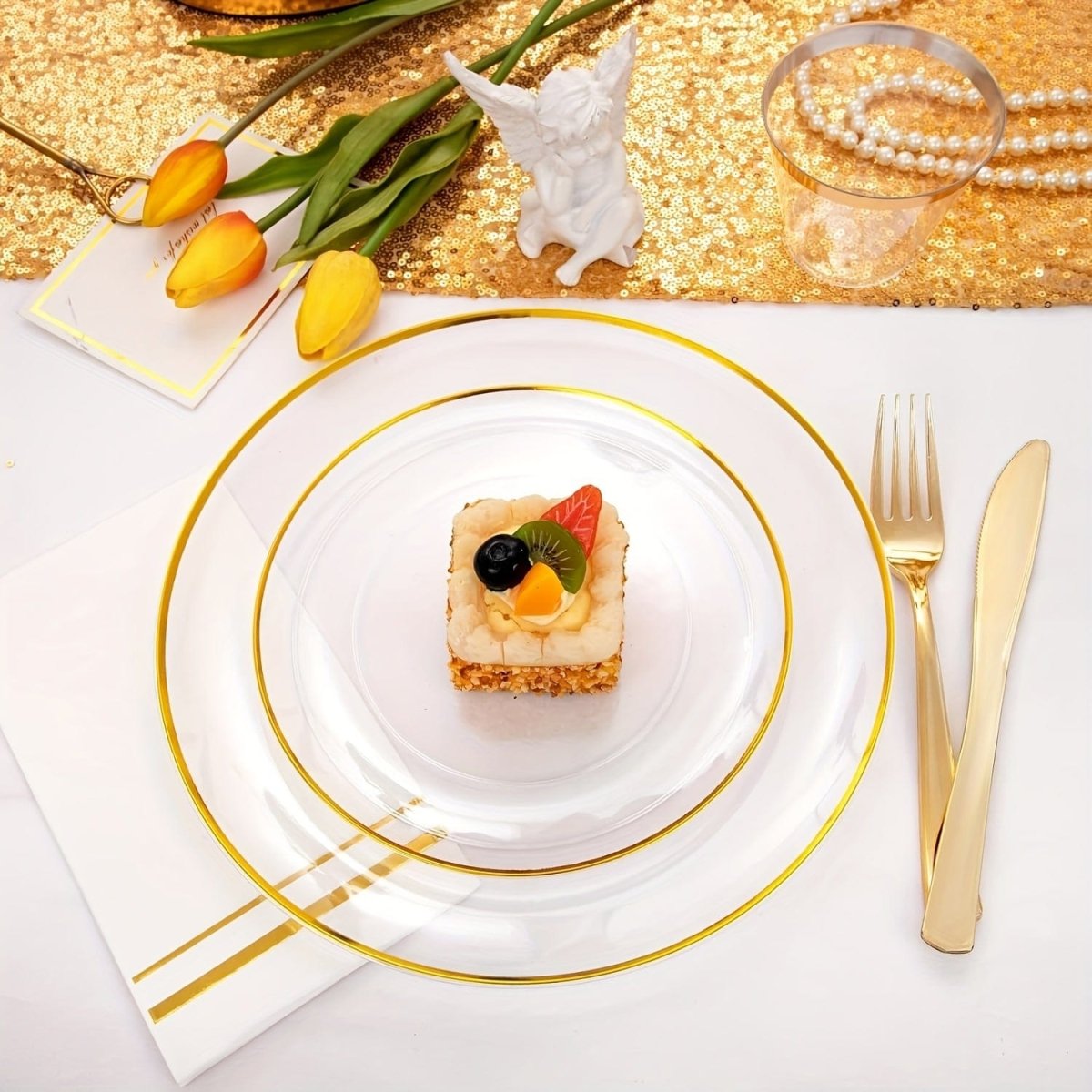 Showlu Fashion Store WDF 350-piece gold plastic cutlery and dinnerware set with plates, cups, napkins, for 50 guests.