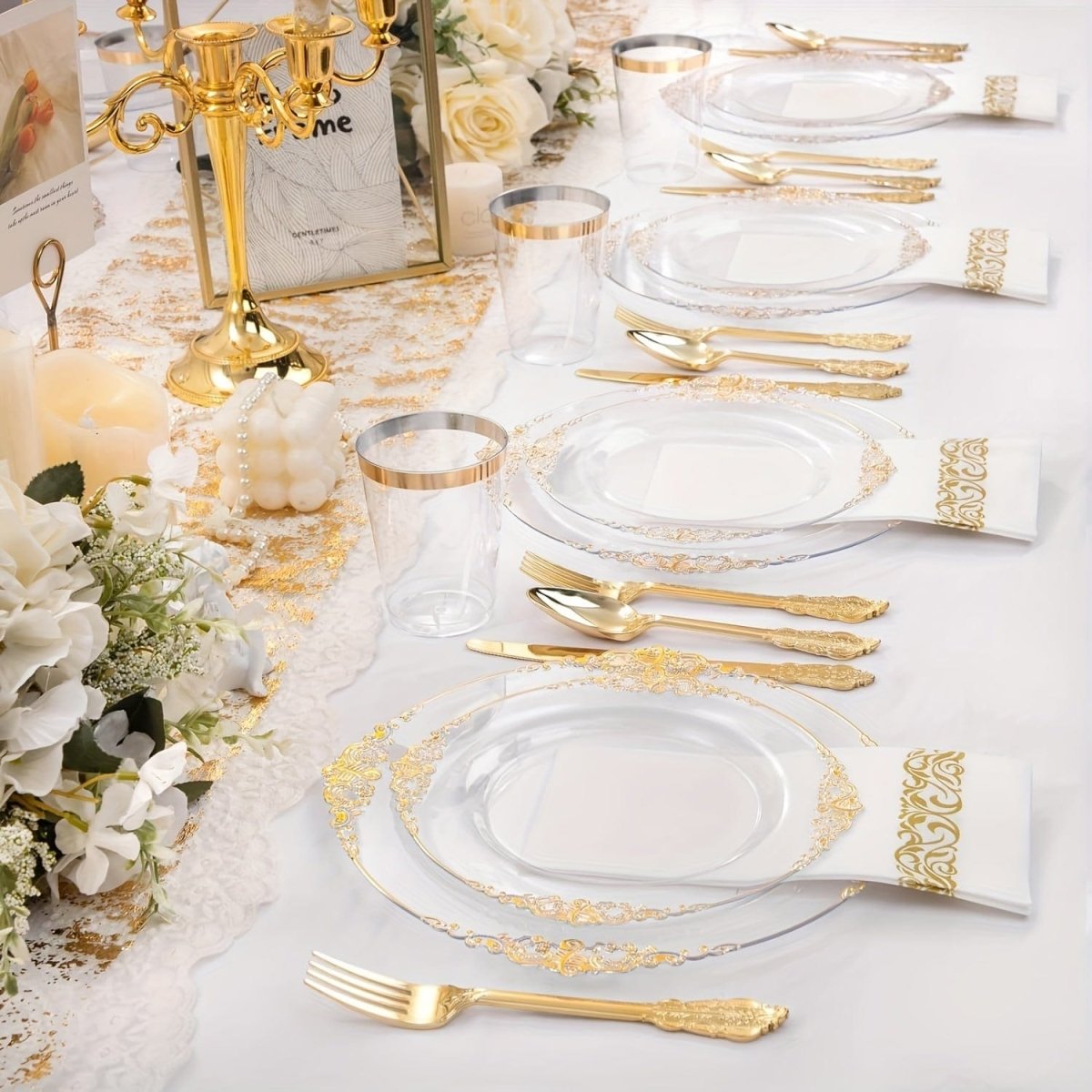 Nervure 350pc gold plastic dinnerware set for 50 guests, includes disposable plates, cups, silverware, and napkins for special events.