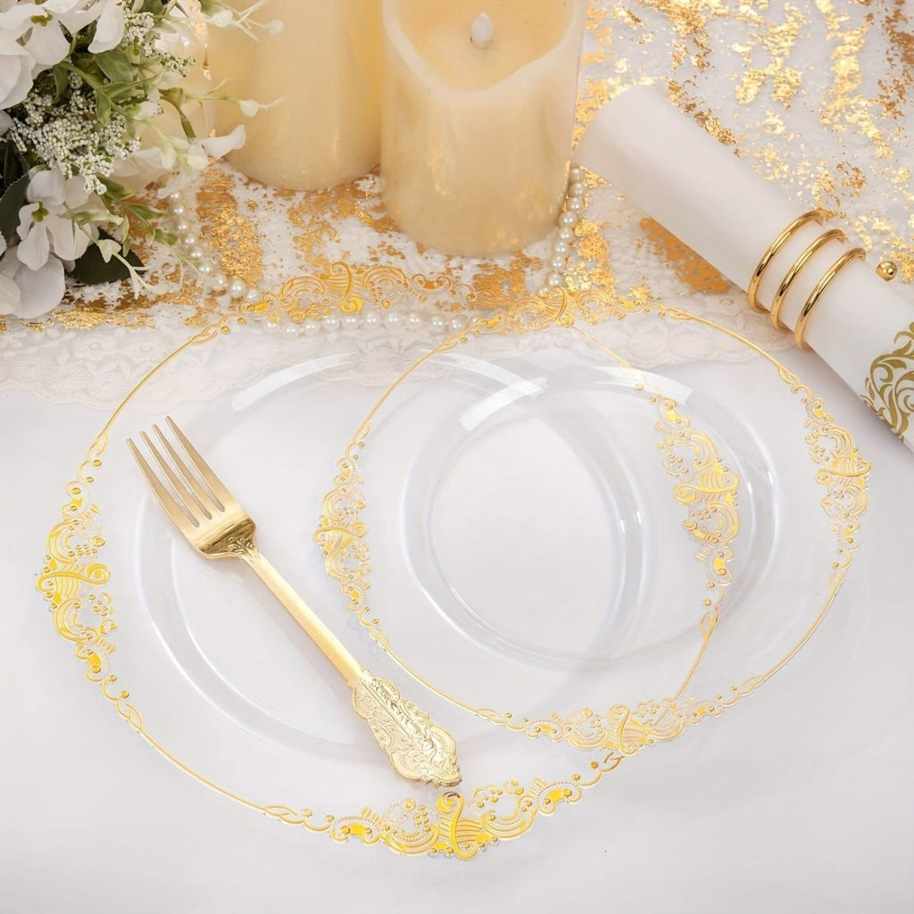Nervure 350pc gold plastic dinnerware set with disposable plates, cups, napkins, and silverware for 50 guests.