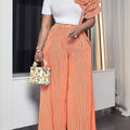 SHOWLU Women's striped two-piece suit with short sleeve top and wide-leg pants, stylish and comfortable fashion ensemble.