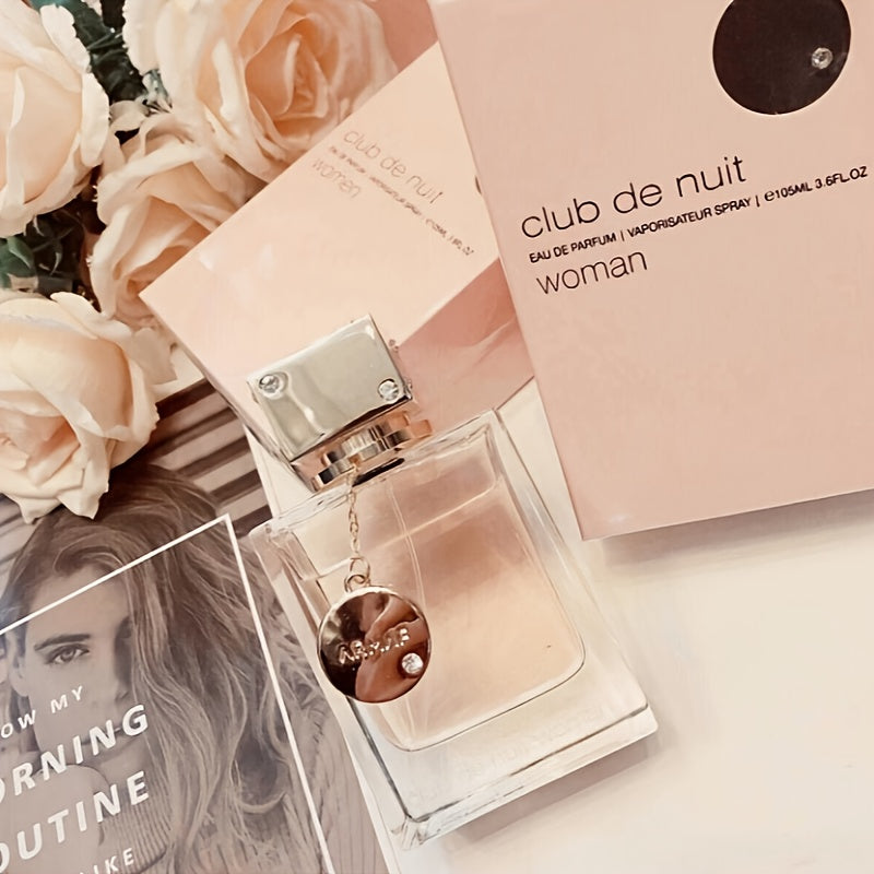 Armaf Club De Nuit Women's Eau De Parfum floral rose spray in 3.4oz bottle, showcasing elegant perfume design and floral accents.