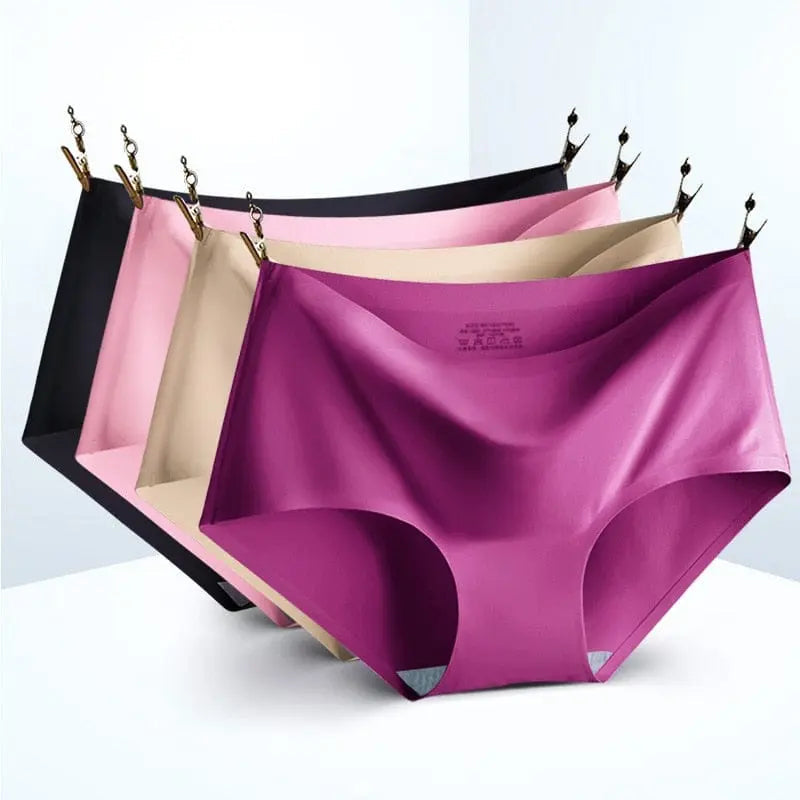 Set of three Showlu Fashion seamless ice silk mid-waist panties for women, in multiple colors, comfortable and breathable lingerie.