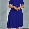 Red SHOWLU Women's V-Neck Ruffle Hem A-Line dress made of polyester, featuring a flowy design and stylish ruffle details.
